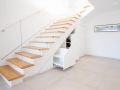 Stiegenstauraum Stiege Schuhschrank